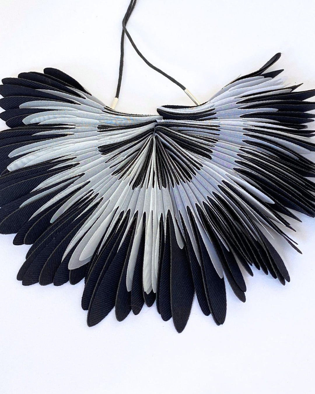 COLLAR Textil, plumas