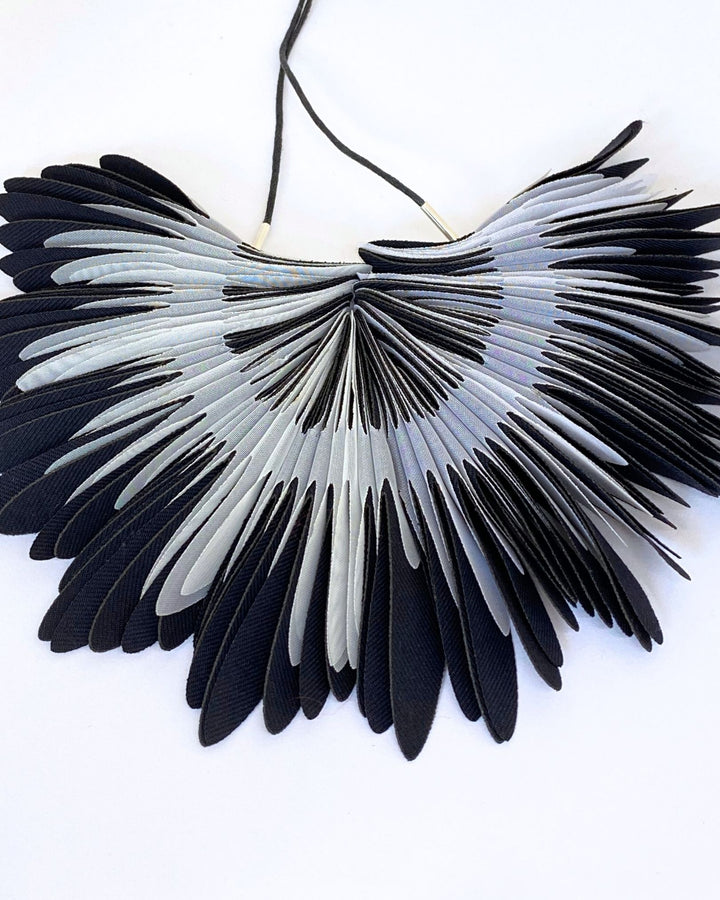 COLLAR Textil, plumas