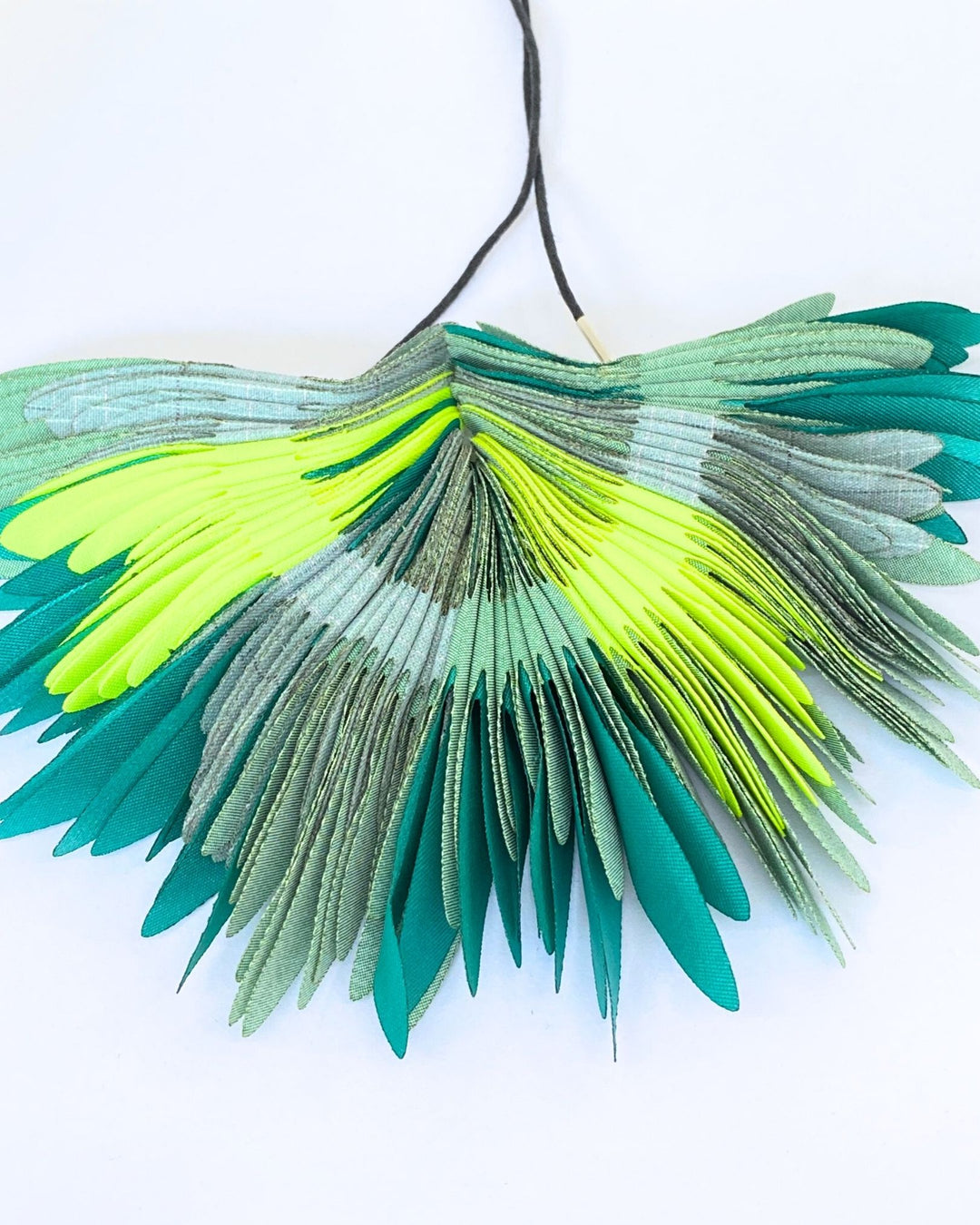 COLLAR Textil, plumas