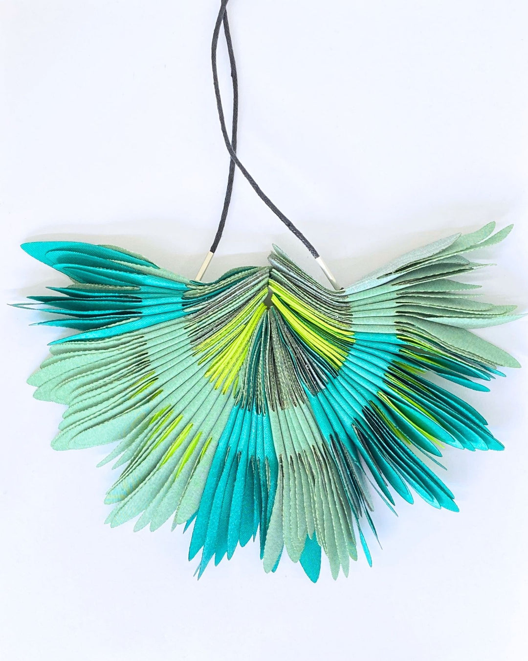 COLLAR Textil, plumas